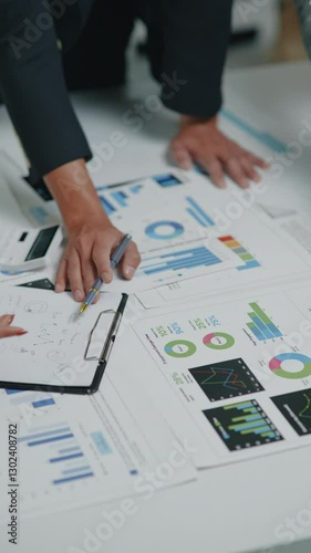 Close up of hand teamwork business group are meeting working and brainstorming about business financial and marketing on paperwork and presentation.