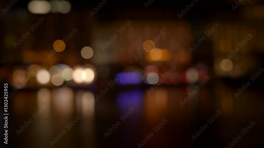 A bokeh background features soft, blurred lights in various shapes and colors A bokeh background features soft, blurred lights in various shapes and colors