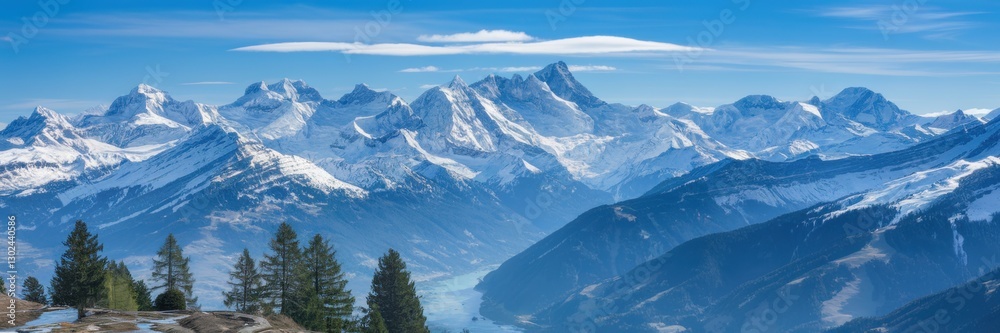 Obraz premium Snowy Alps, where snow-capped peaks stretch as far as the eye can see. In the foreground are green trees and a winding river. A banner with space for the text.