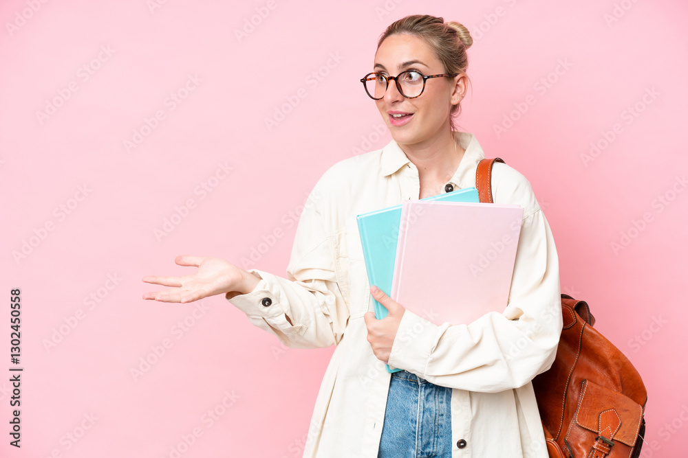 Young student caucasian woman isolated on pink background with surprise expression while looking side Young student caucasian woman isolated on pink background with surprise expression while looking side