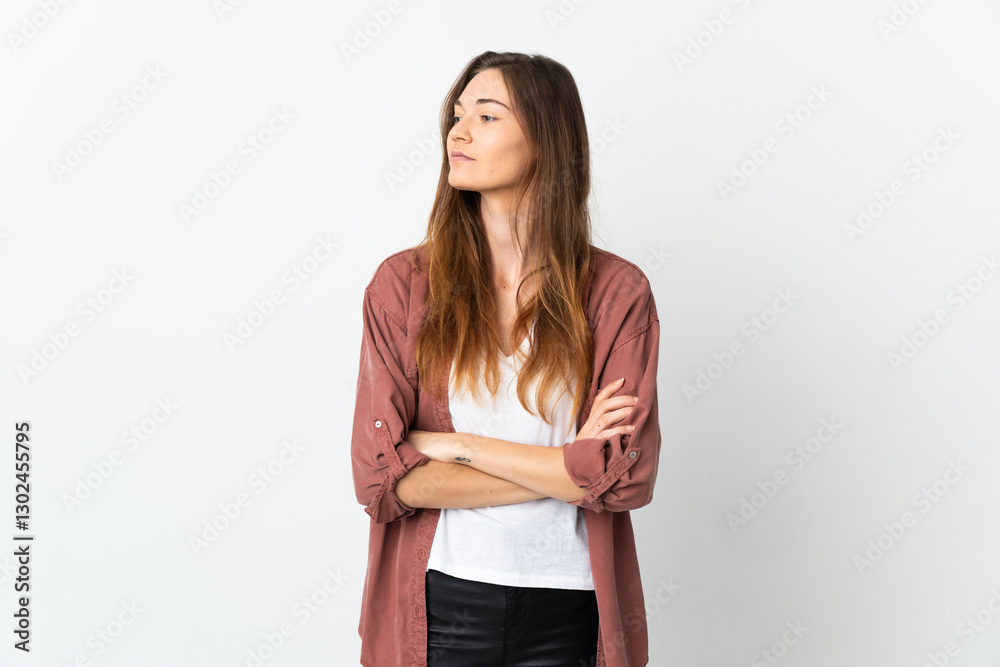 Young Ireland woman isolated on white background looking to the side Young Ireland woman isolated on white background looking to the side