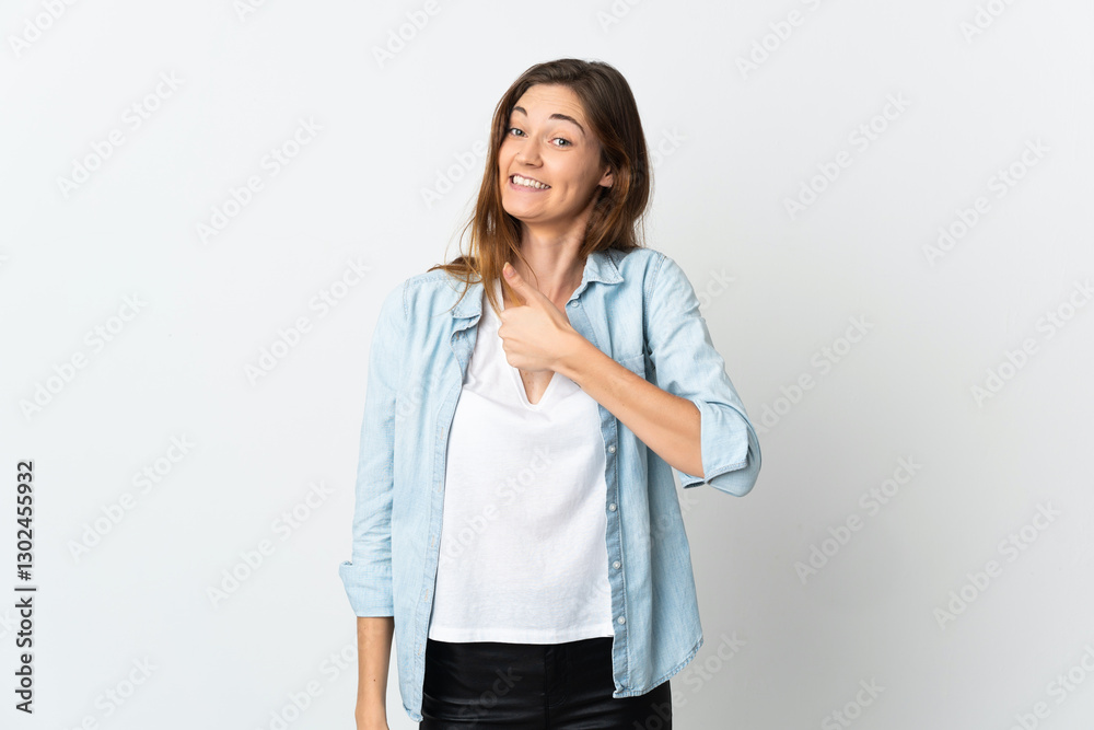 Young Ireland woman isolated on white background giving a thumbs up gesture Young Ireland woman isolated on white background giving a thumbs up gesture