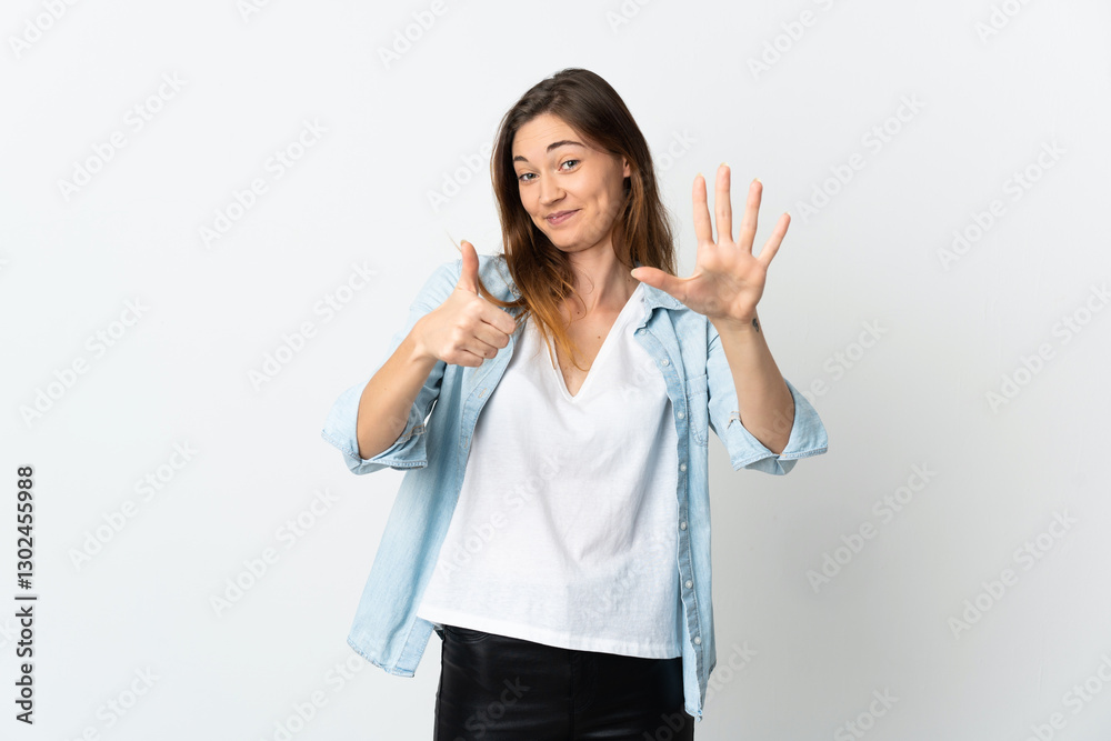 Young Ireland woman isolated on white background counting six with fingers Young Ireland woman isolated on white background counting six with fingers
