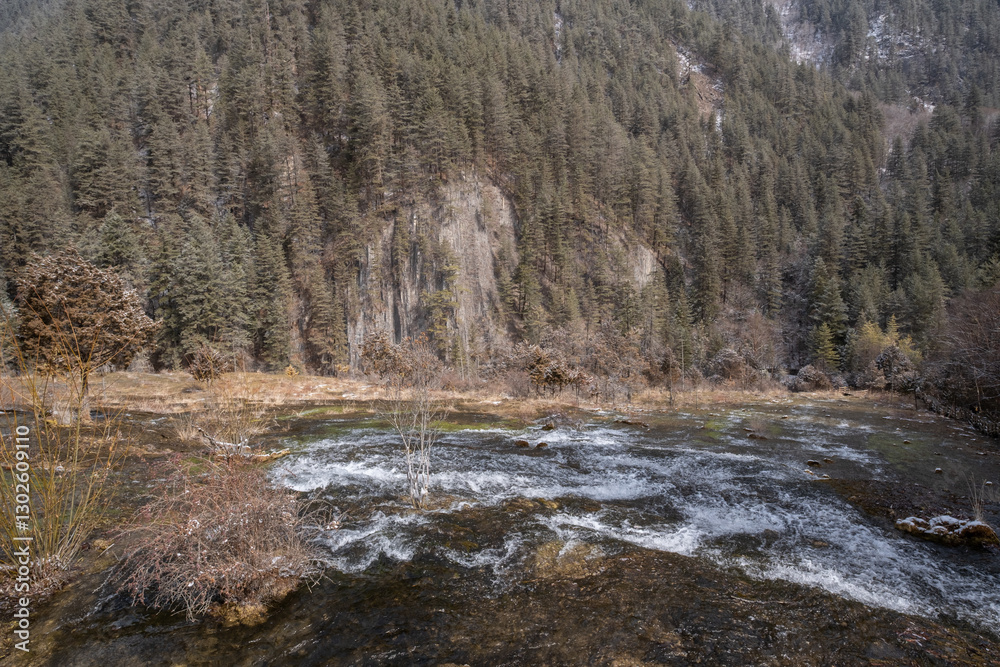 Pearl Shoal Waterfall in winter season, is a waterfall located in Jiuzhaigou, Sichuan Province, China, steam, cascade