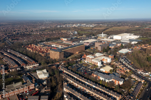 Obraz na płótnie Aerial drone photo of the city of York in North Yorkshire, England showing the large Nestle chocolate factory in the city showing the large building surrounded by houses and homes in the winter time w salonie