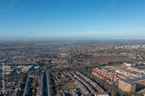 Obraz na płótnie Aerial drone photo of the city of York in North Yorkshire England showing a birds eye view of the British town and rows of houses and large suburban housing estates taken in the winter time w salonie