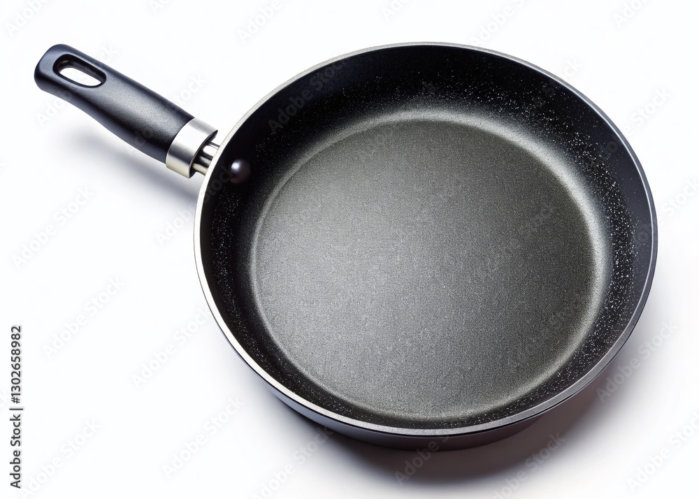 High-Angle Aerial Shot of Black Steel Frying Pan on White Background High-Angle Aerial Shot of Black Steel Frying Pan on White Background