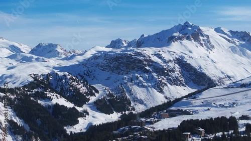 Wallpaper Mural Experience stunning aerial views of Courchevel, France, where snowcovered mountains and beautiful winter landscapes provide the perfect backdrop for skiing and outdoor adventures Torontodigital.ca