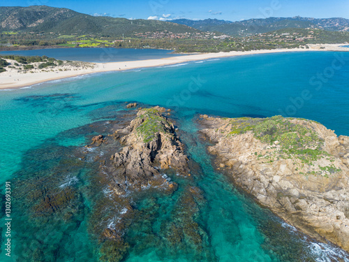 Fototapeta Naklejka Na Ścianę i Meble -  Su Giudeu bay, with crystal clear water and white sand, view from the drone, Su Giudeu beach, Chia, Domus de Maria, Sardinia, Italy
