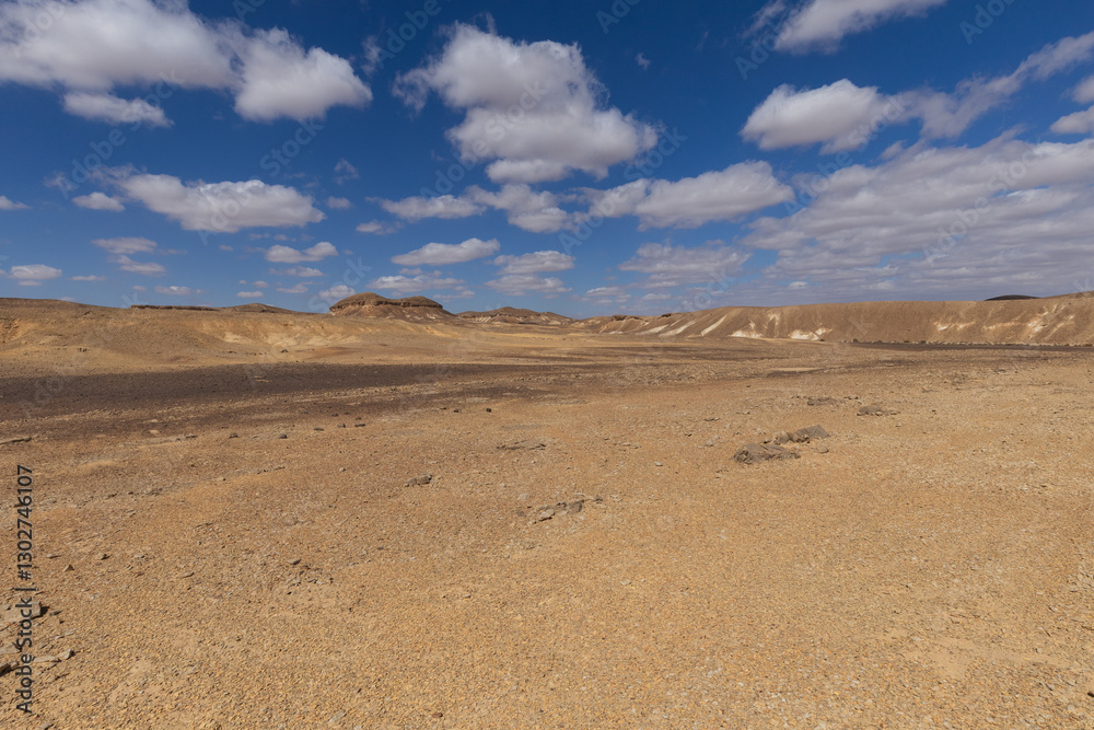 travel through the sandy desert, blue sky and many clouds travel through the sandy desert, blue sky and many clouds