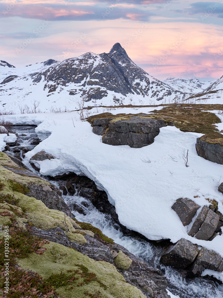 Obraz premium snowy waterfall in the highlands of Senja Island, Northern Norway
