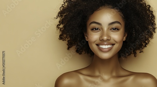 Beautiful black woman with clean and healthy skin, a big smile on her face, curly black hair