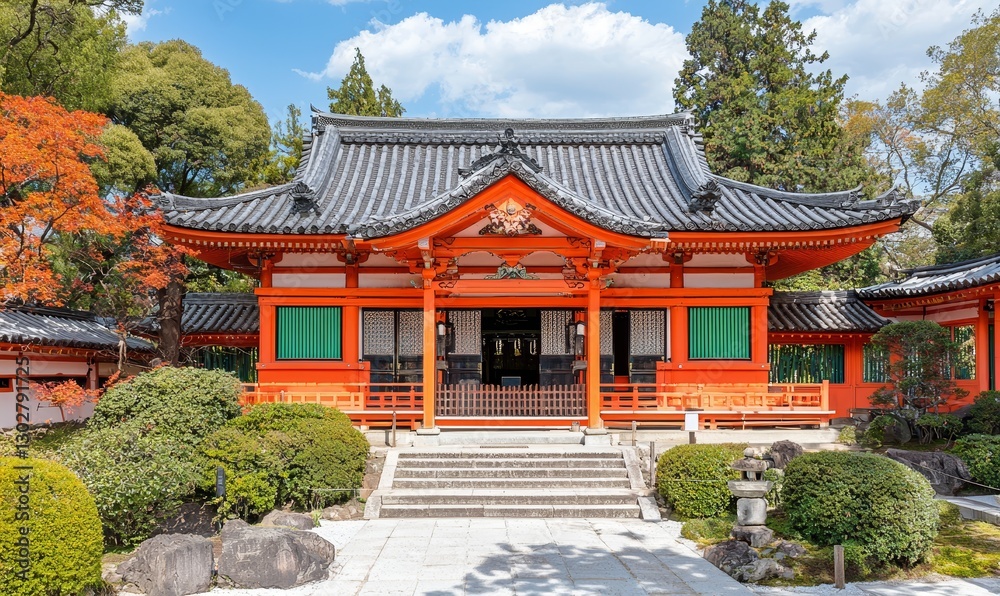 Traditional Japanese temple with orange facade, steps, trees, and garden in peaceful setting Traditional Japanese temple with orange facade, steps, trees, and garden in peaceful setting