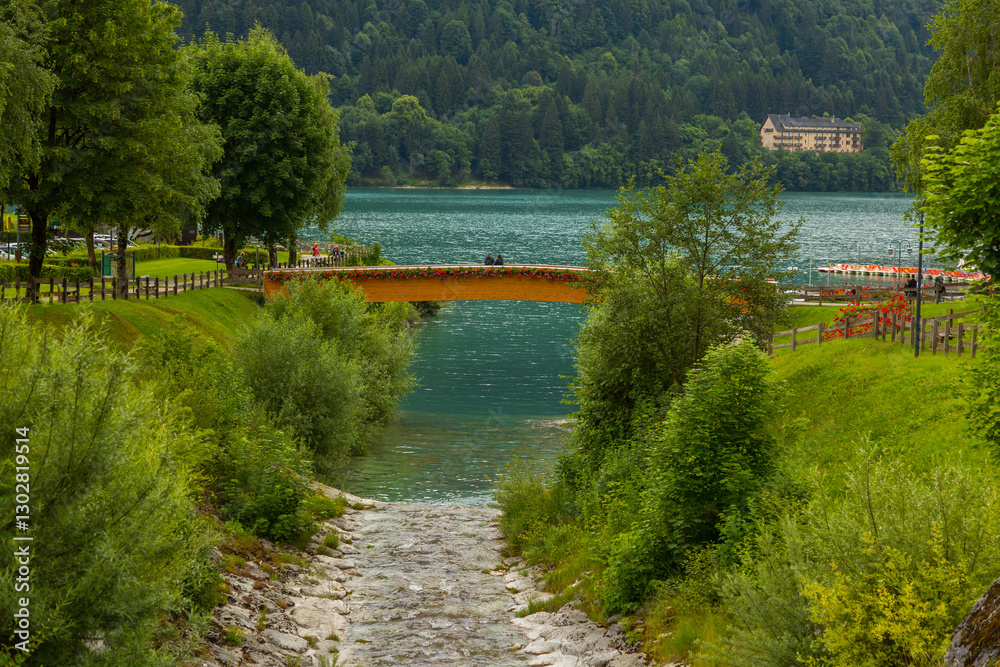 Fototapeta premium Beautiful traditional summer view in Molveno, Trentino Alto Adige, Italy, scenic village, lake, and mountain landscape