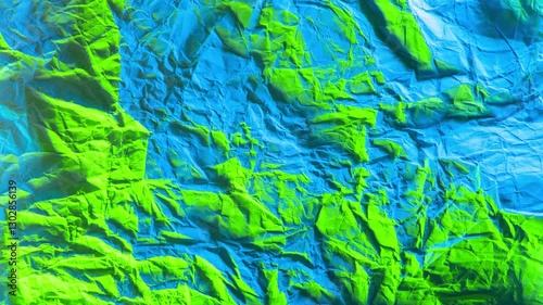 Crumpled colourful green blue lights paper stop motion animation Crumpled paper sheet texture with a stop motion effect, seamless loop. Animation. Abstract creased paper, concept of art Background