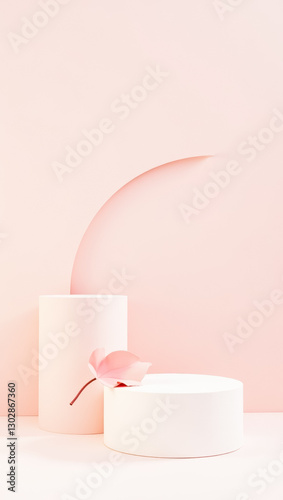 two pastel pink cylindrical platforms with a delicate pink leaf