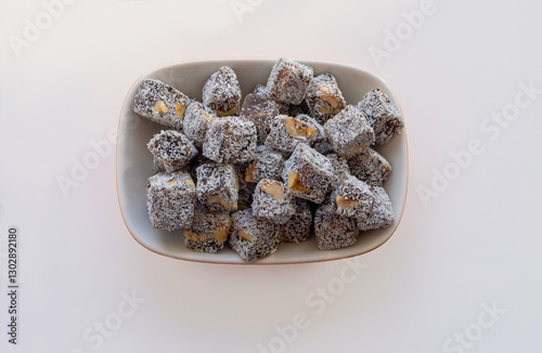 Obraz na płótnie Turkish delight with black grapes and hazelnuts w salonie