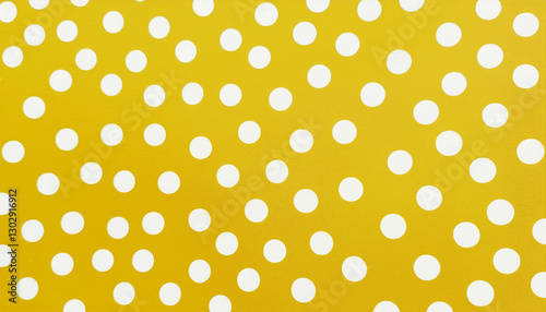 Yellow and beige colored polkadot pattern background with dots in abstract shapes and sizes as stylish wallpaper design or wrapping paper