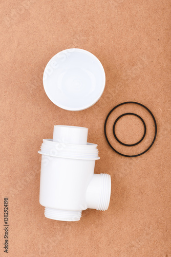 Wallpaper Mural White plastic sink drain trap with threaded ends with rubber gaskets. Torontodigital.ca