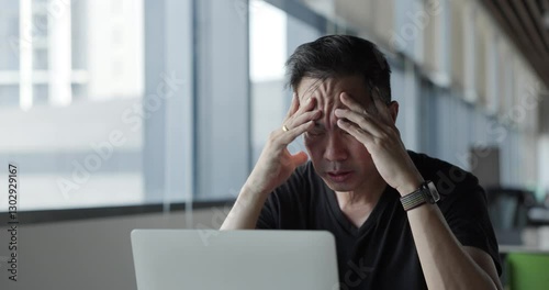 Asian businessman burn out on failed job in office. Elderly office worker expresses emotions Failed to work No success. Financial Communication Business problem. Working too hard overtime