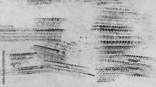 Obraz na płótnie Black tire marks on road, Black rubber tire marks and tread marks, Tire trace track wheels texture and background, Auto tire tread grunge, Car wheel tyre tread track black tyre print, Top view. w salonie