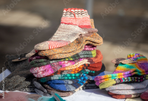 A pile of colorful socks on a table