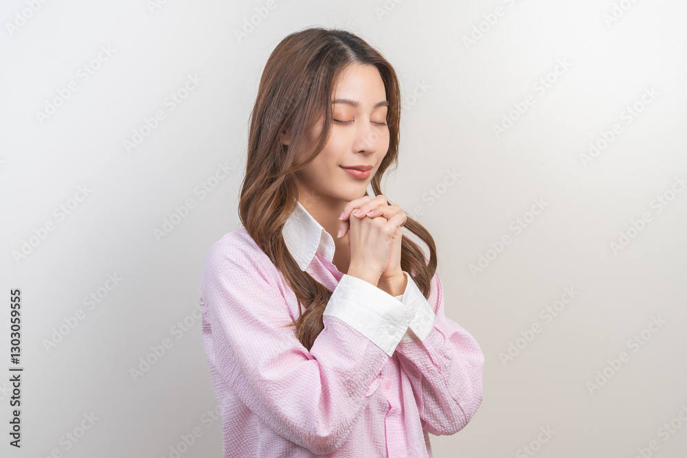 Believe faith charity, calm asian young woman show gratitude, folded hands in prayer feel grateful, meditating with her eyes closed, praying to request God for help. Religious, forgiveness concept. Believe faith charity, calm asian young woman show gratitude, folded hands in prayer feel grateful, meditating with her eyes closed, praying to request God for help. Religious, forgiveness concept.