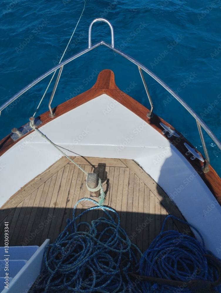The bow of a boat, yacht, in the azure sea