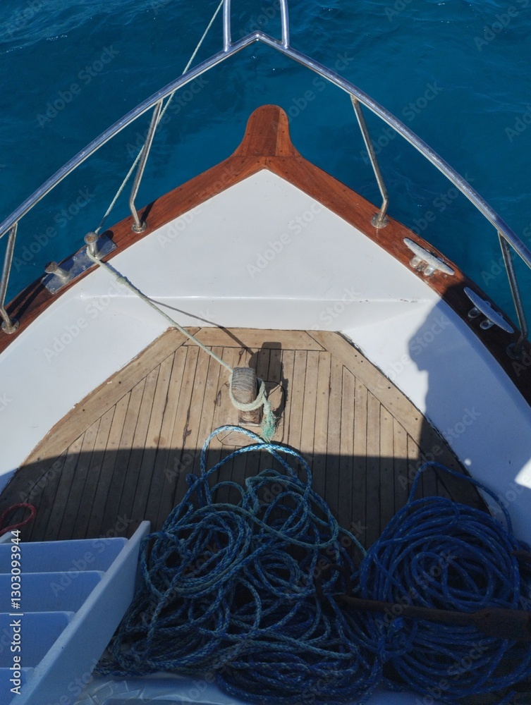 The bow of a boat, yacht, in the azure sea