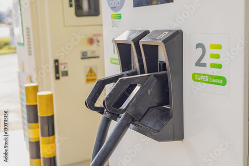 Public electric vehicle charging stations in shopping malls. Concept of reducing air pollution and using clean energy instead of combustion fuel