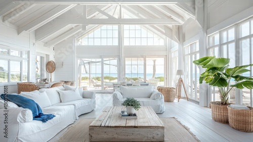 Coastal Living Room: A bright and airy coastal-themed living room bathed in natural light, inviting relaxation with its open space and serene atmosphere.