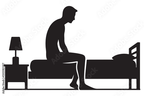 Silhouette of a Man Sitting on a Bed Edge With Lamp