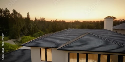 Wallpaper Mural modern house with a stunning view of trees during a breathtaking sunset Torontodigital.ca