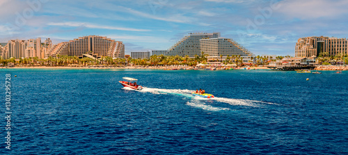 Water sport activities and resting on the Red Sea. Panoramic view on central ...
