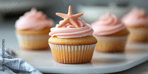 Sweet Coastal Cupcakes: Delicate cupcakes topped with pastel pink frosting and a starfish, evoking the essence of a seaside treat