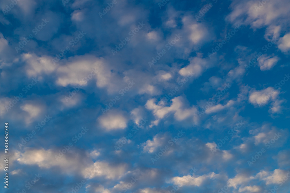 Serene Blue Sky With Soft White Clouds During the Day