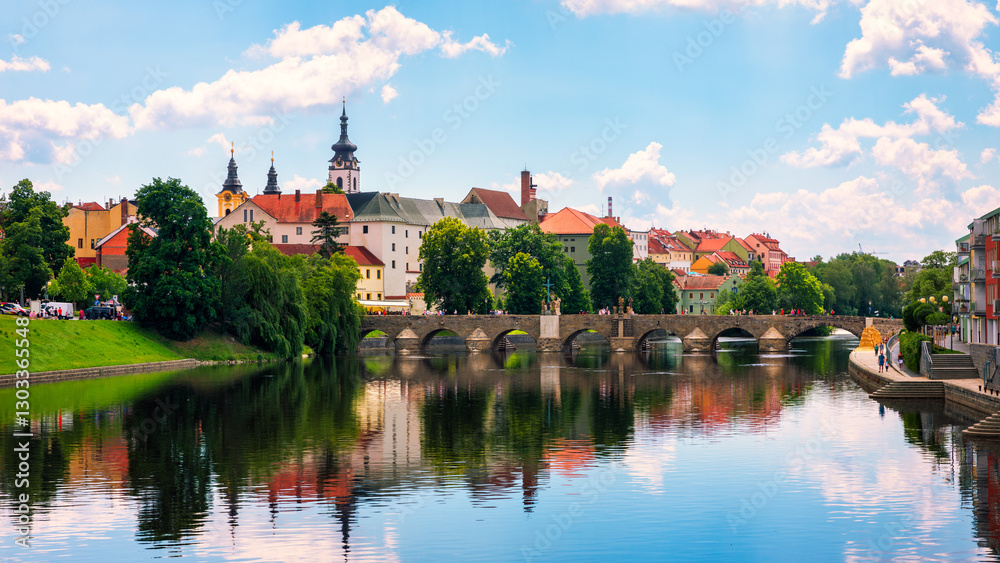 Medieval Town Pisek and historic stone bridge over river Otava in the Southern Bohemia, Czech Republic. Pisek Stone Bridge, the oldest preserved early Gothic bridge in the Czech republic. Medieval Town Pisek and historic stone bridge over river Otava in the Southern Bohemia, Czech Republic. Pisek Stone Bridge, the oldest preserved early Gothic bridge in the Czech republic.