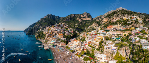 Fototapeta Naklejka Na Ścianę i Meble -  Aerial view of Positano with comfortable beach and blue sea on Amalfi Coast in Campania, Italy. Positano village on the Amalfi Coast, Salerno, Campania. Beautiful Positano, Amalfi Coast in Campania.