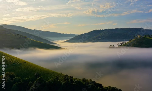 4K Time-Lapse of Clouds Rolling Over Green Hills and Mountains with Fog, Wind, and Rain