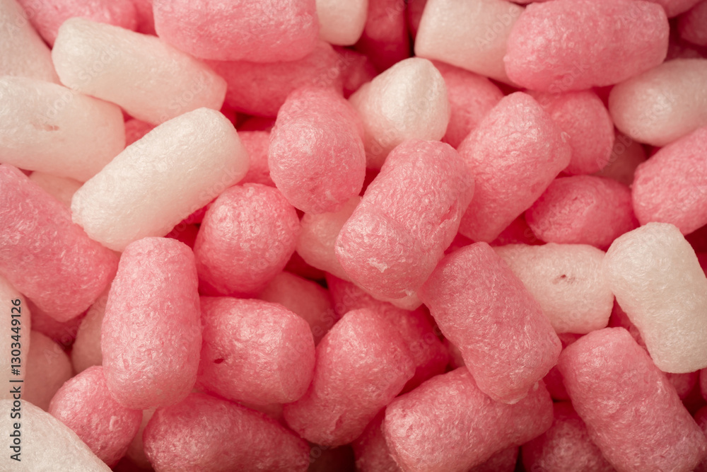 Pink and white box filler as a background. Top view. Pink and white box filler as a background. Top view.