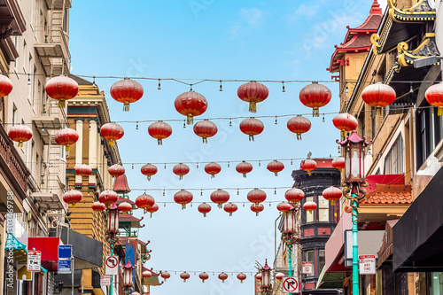 Photography A view up a decorated street in Chinatown in the morning in San Francisco in ear