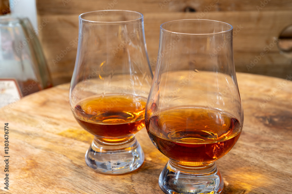 Scotch single malt and blended whisky tasting on distillery in Scotland close up Scotch single malt and blended whisky tasting on distillery in Scotland close up