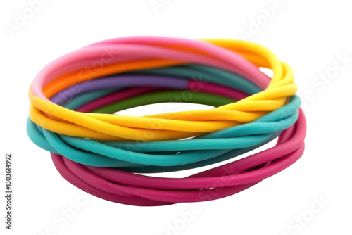 Colorful twisted rubber bands stacked playfully on a white background showcasing vibrant hues isolated on transparent background photo