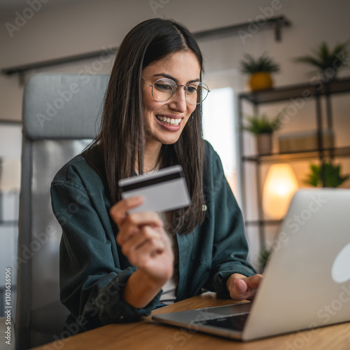 businesswoman work from home and buy online on laptop and credit card