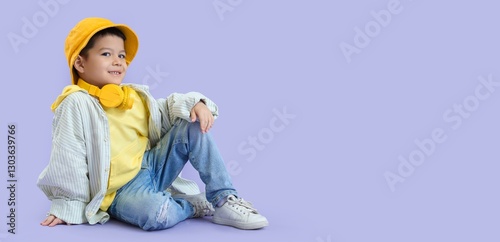 Asian boy in adult clothes ...