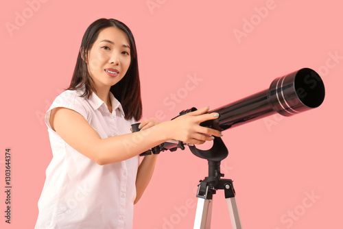 Young Asian woman using tel...