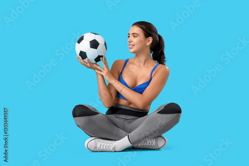 Sporty young woman with soc...