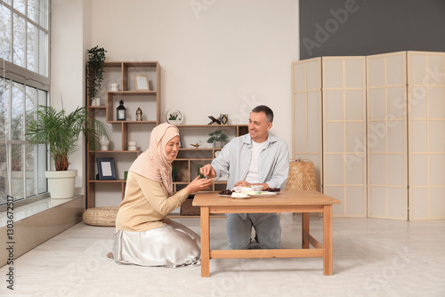 Happy Muslim woman with her...