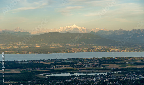 Scenic view of a the lake Geneva and the majestic Swiss Alps at sunset, with the Mont Blanc in the middle