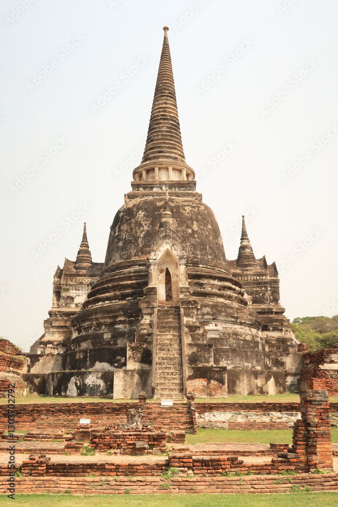 Picturesque view onto one of the stupas, pagodas of the Wat Phra Si Sanphet Temple, Ayutthaya Historical Park, Thailand Picturesque view onto one of the stupas, pagodas of the Wat Phra Si Sanphet Temple, Ayutthaya Historical Park, Thailand